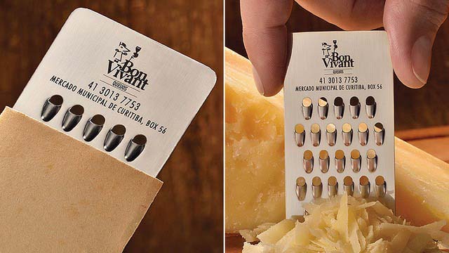 A cheese shop with a cheese grater business card