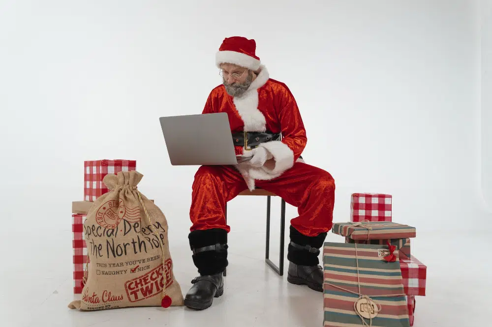 Best Free Christmas Design Assets for Designers: Santa With Laptop