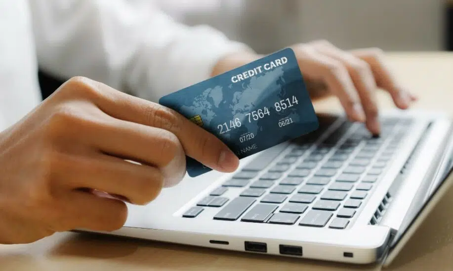 Consumer with credit card making online purchase